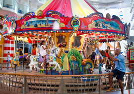 Hand-carved carousel and classic carnival games at the new Boardwalk Arcade.